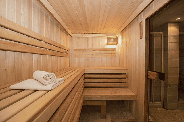 sauna goers, wear a towel, using the sauna, gym sauna etiquette